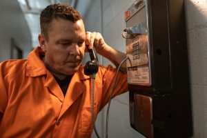 prisoner making a phone call