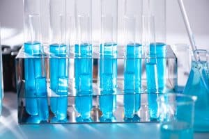 lab tubes with blue liquid