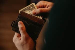 Pulling Money Out of Wallet